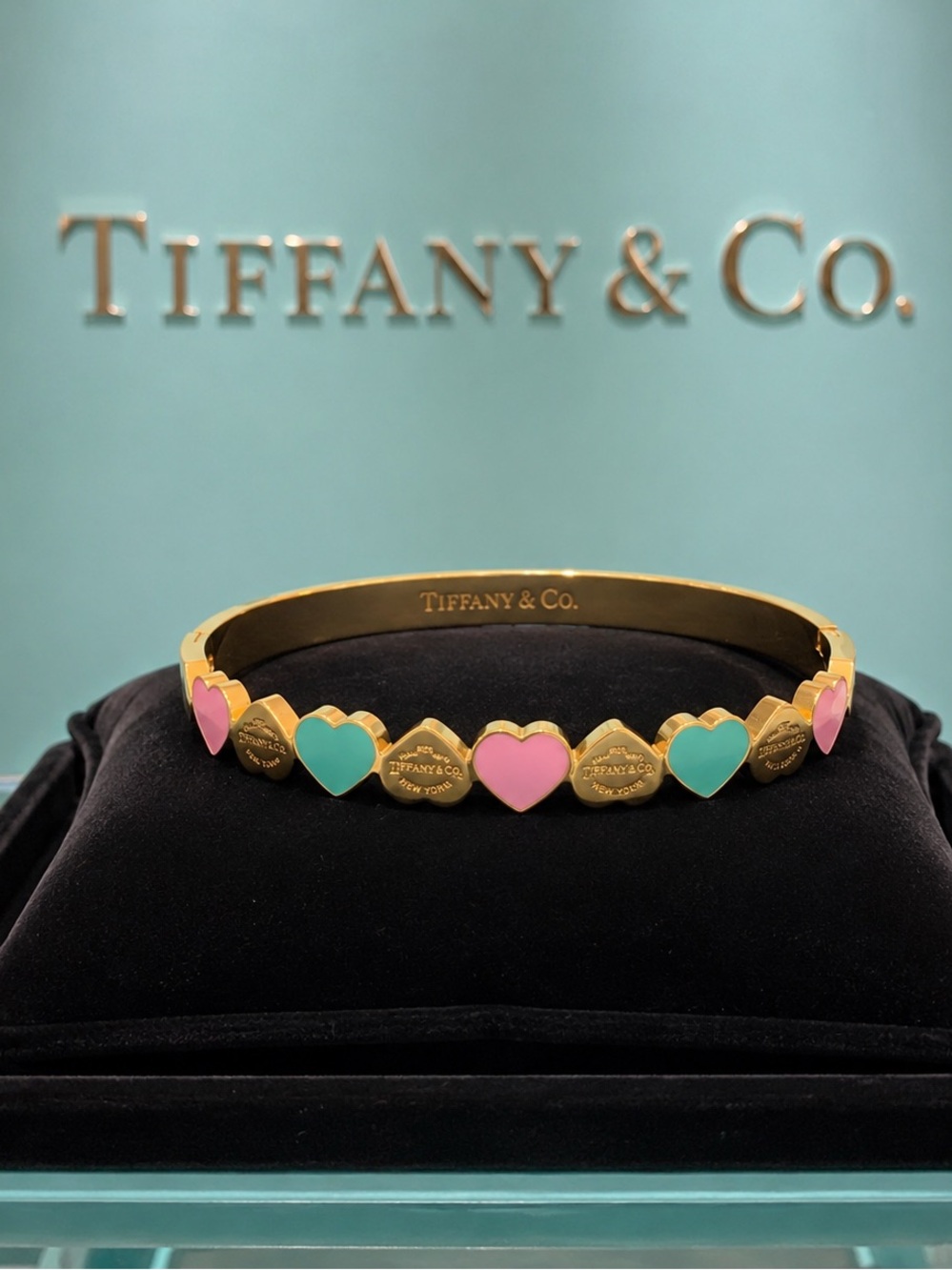 Tiffany & Co. stamped Gold toned Heart Enamel Bangle in Pink & Turquoise